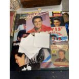 A LARGE COLLECTION OF ELVIS PRESLEY LPS AND SINGLES ON VINYL