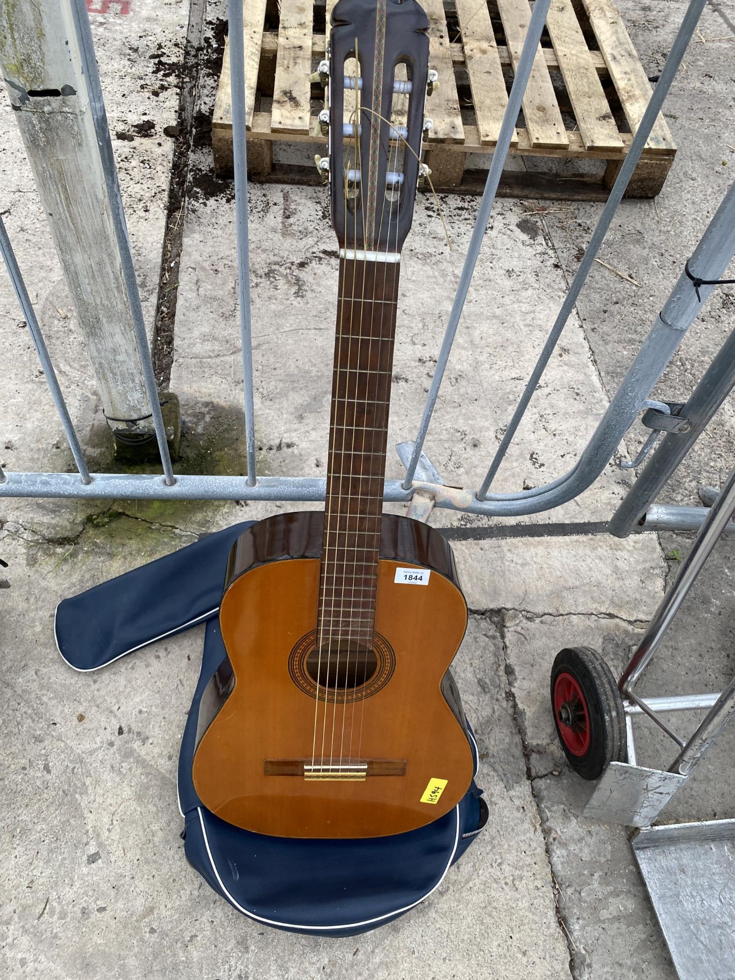 AN ANGELICA 2848 ACOUSTIC GUITAR AND CARRY CASE