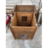 A WOODEN CRATE AND DOG KENNEL FRAME