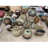 A LARGE ASSORTMENT OF STUDIO POTTERY TO INCLUDE VASES AND BOWLS ETC