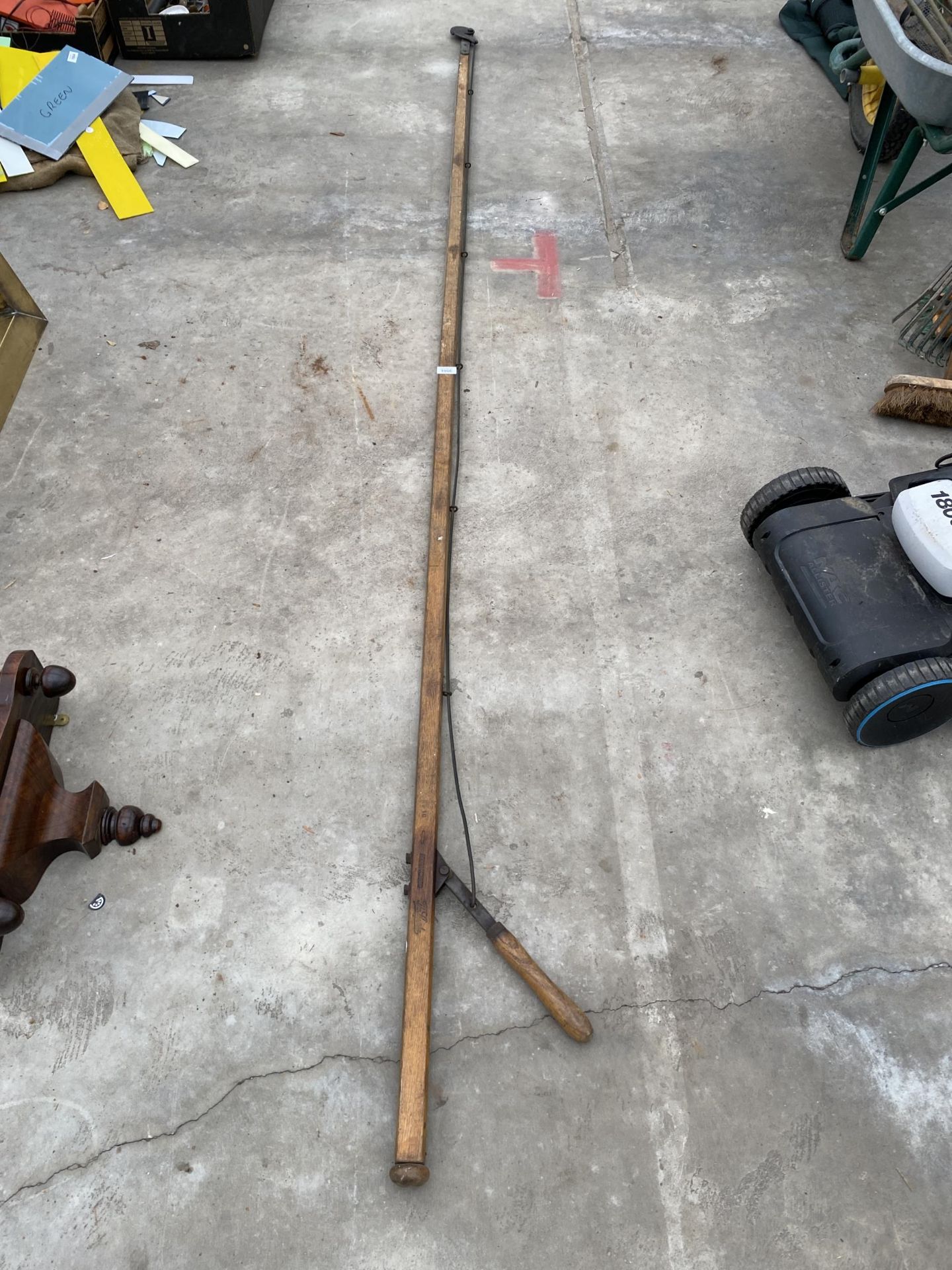 A VINTAGE WOODEN LONG REACH LOPPER