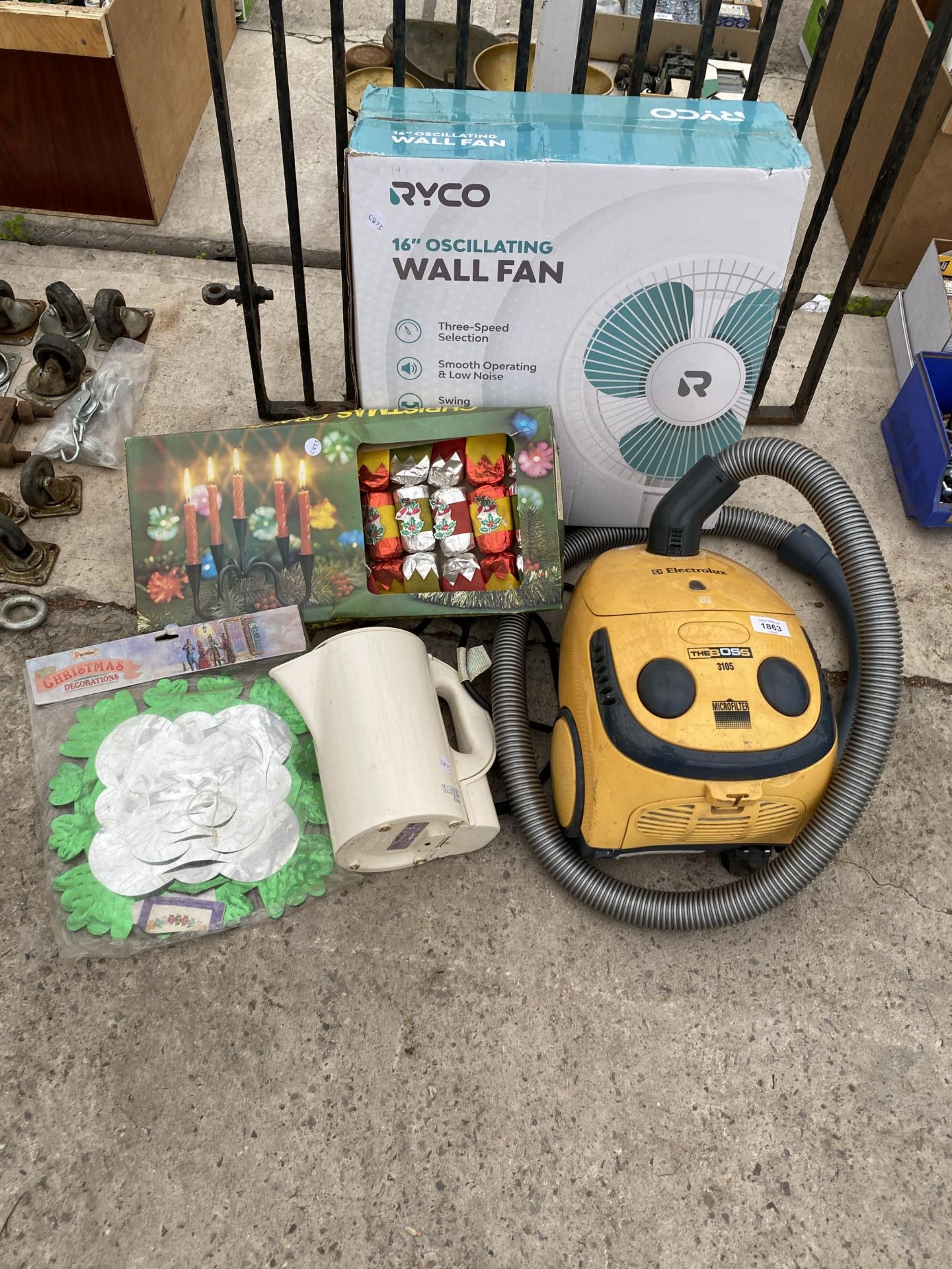 AN ASSORTMENT OF ITEMS TO INCLUDE AN ELECTROLUX VACUUM CLEANER, A WALL FAN AND A KETTLE ETC