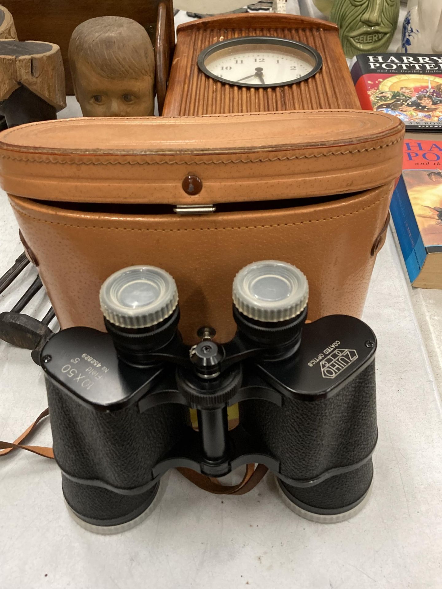 A PAIR OF ZUIHO BINOCULARS IN A CASE