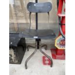 AN INDUSTRIAL ADJUSTABLE MACHINIST CHAIR