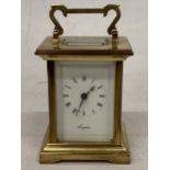 A VINTAGE ANGELUS FRENCH BRASS CASED CARRIAGE CLOCK