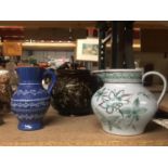 A LARGE VICTORIAN DOUBLE SPOUTED TEAPOT (ONE OF THE SPOUTS A/F), PLUS TWO STUDIO POTTERY JUGS WITH