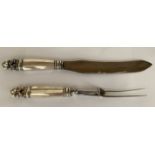 AN ART DECO GEORG JENSEN STERLING SILVER TWO PIECE MEAT CARVING SET IN THE ACORN PATTERN -