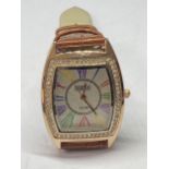 A WRIST WATCH SEEN IN WORKING ORDER BUT NO WARRANTY