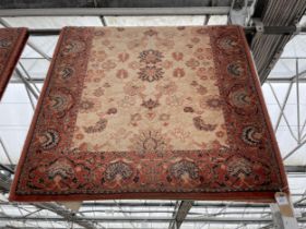 AN ORANGE PATTERNED HARTH RUG