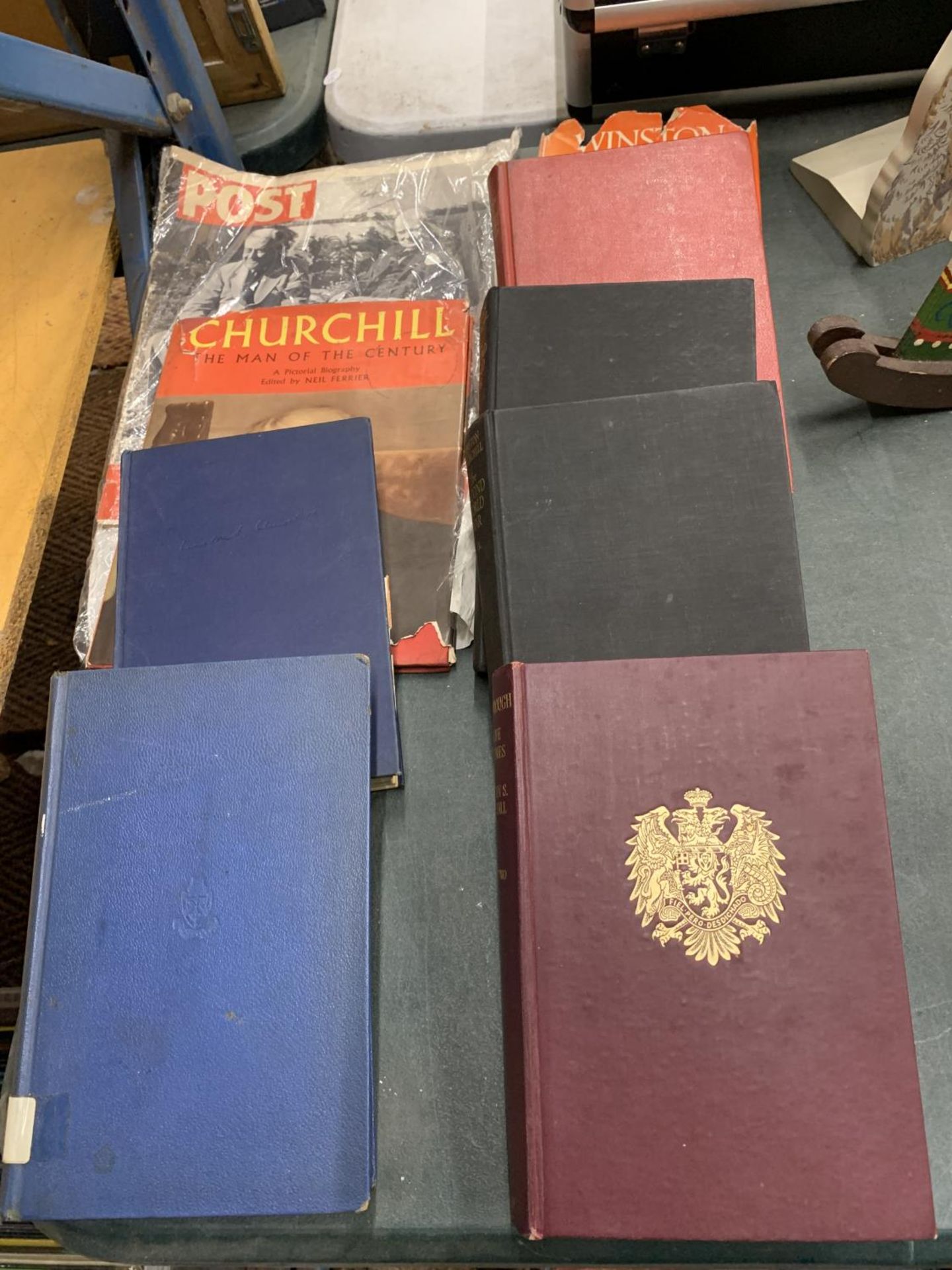A COLLECTION OF WINSTON CHURCHILL BOOKS TO INCLUDE 'HIS LIFE AND TIMES', 'THE SECOND WORLD WAR'