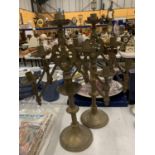 A PAIR OF VINTAGE BRASS CONCERTINA STYLE CANDLESTICKS