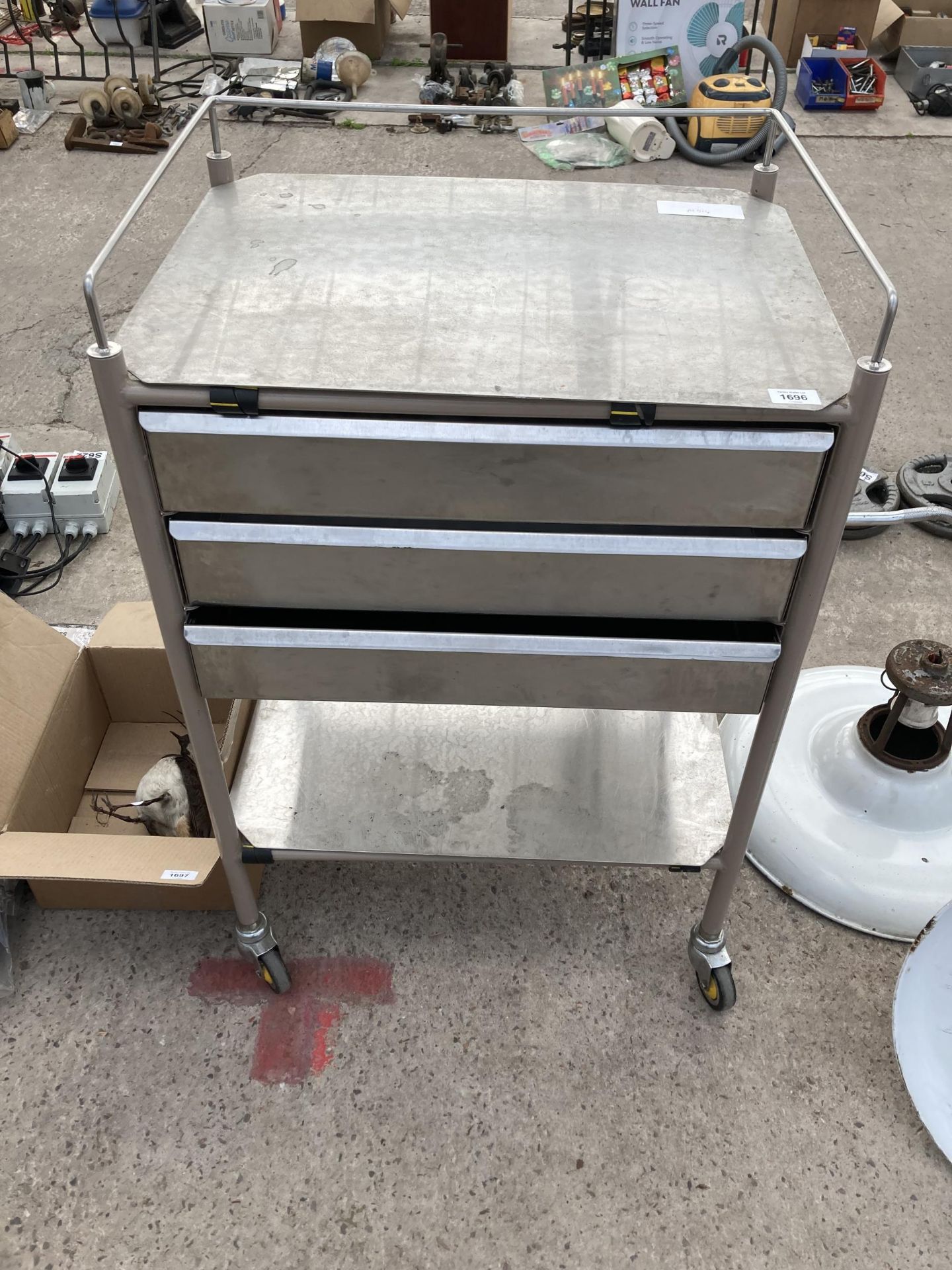 A METAL 'BISTROL MAID' MEDICAL TROLLEY