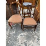 AN EDWARDIAN MAHOGANY AND INLAID ELBOW CHAIR AND VICTORIAN PARLOUR CHAIR
