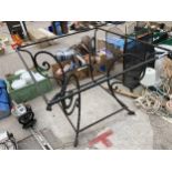 A LARGE DECORATIVE WROUGHT IRON PATIO TABLE BASE