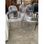 A SET OF EIGHT VICTORIA GHOST TRANSPARENT DINING CHAIRS, TWO BEING CARVERS, DESIGN S & ARCK BY