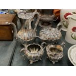 A FOUR PIECE SILVER PLATED SET TO INCLUDE A TEAPOT, COFFEE POT, CREAM JUG AND SUGAR BOWL