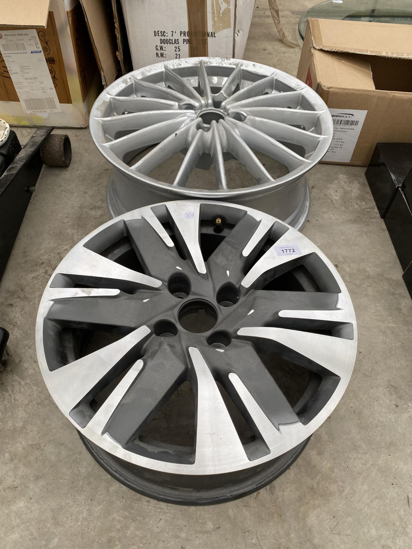 TWO VARIOUS ALLOY CAR RIMS