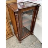 A VICTORIAN STYLE MAHOGANY MUSIC CABINET WITH GLASS DOOR