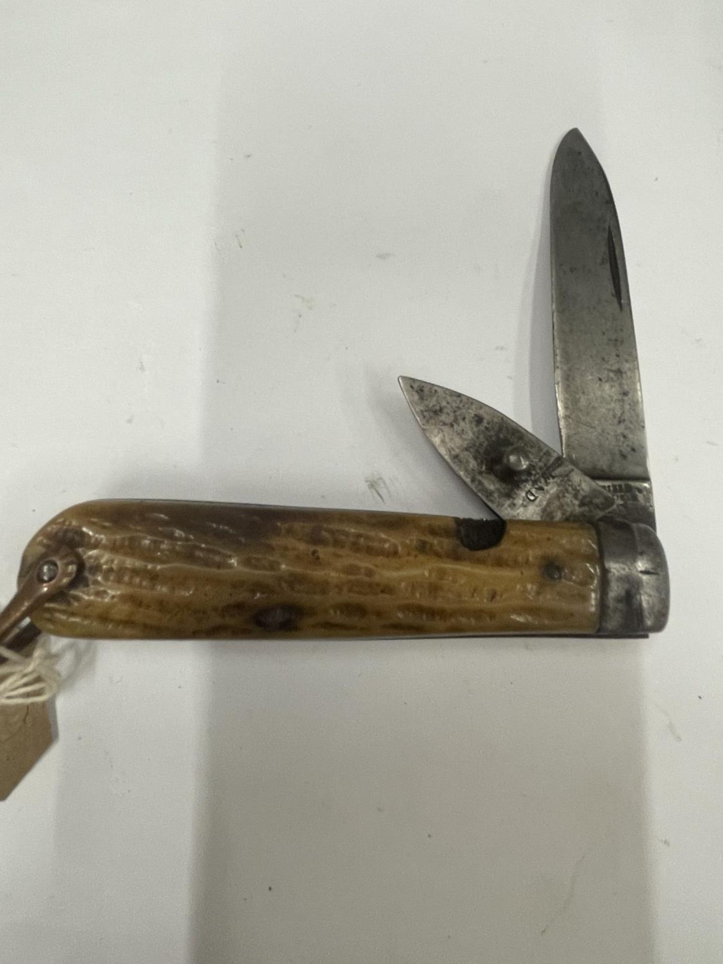 A VINTAGE SHEFFIELD POCKET KNIFE INDISTINCT MAKER