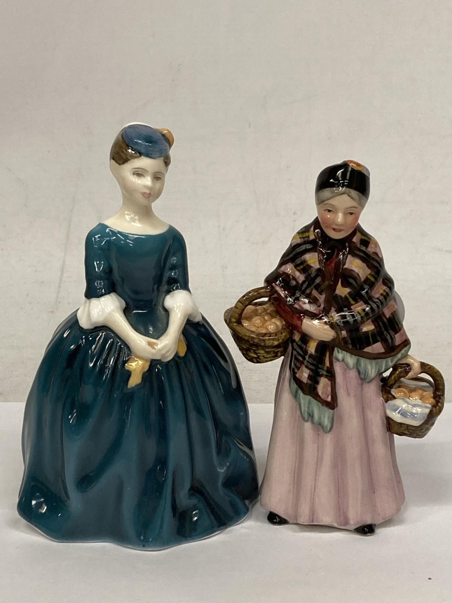 TWO ROYAL DOULTON FIGURINES "THE ORANGE LADY" FROM THE MINIATURE STREET VENDORS AND CHERIE HN2341