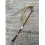 A VINTAGE INDIAN HORSE HAIR FLY WHISK SWAT WITH BELIEVED INDIAN SILVER COLLARS AND FERIAL