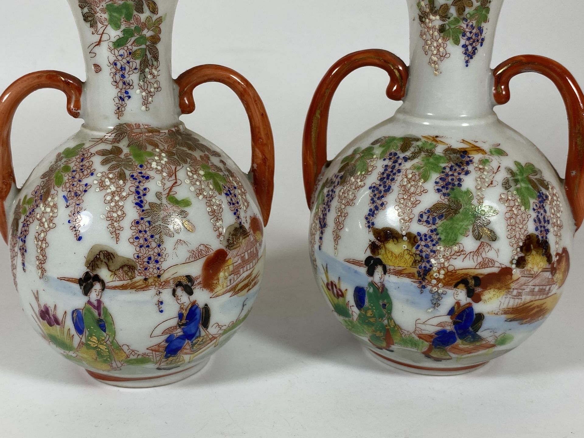 A PAIR OF JAPANESE TWIN HANDLED PORCELAIN VASES WITH LAKESIDE SCENE, HEIGHT 14CM - Image 3 of 6