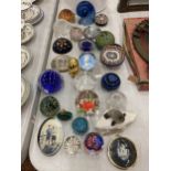 A LARGE QUANTITY OF GLASS PAPERWEIGHTS TO INCLUDE MILLEFIORI STYLE