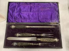 A VINTAGE BOXED CARVING SET