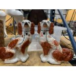 A PAIR OF VINTAGE STAFFORDSHIRE STYLE SPANIELS, HEIGHT 29CM