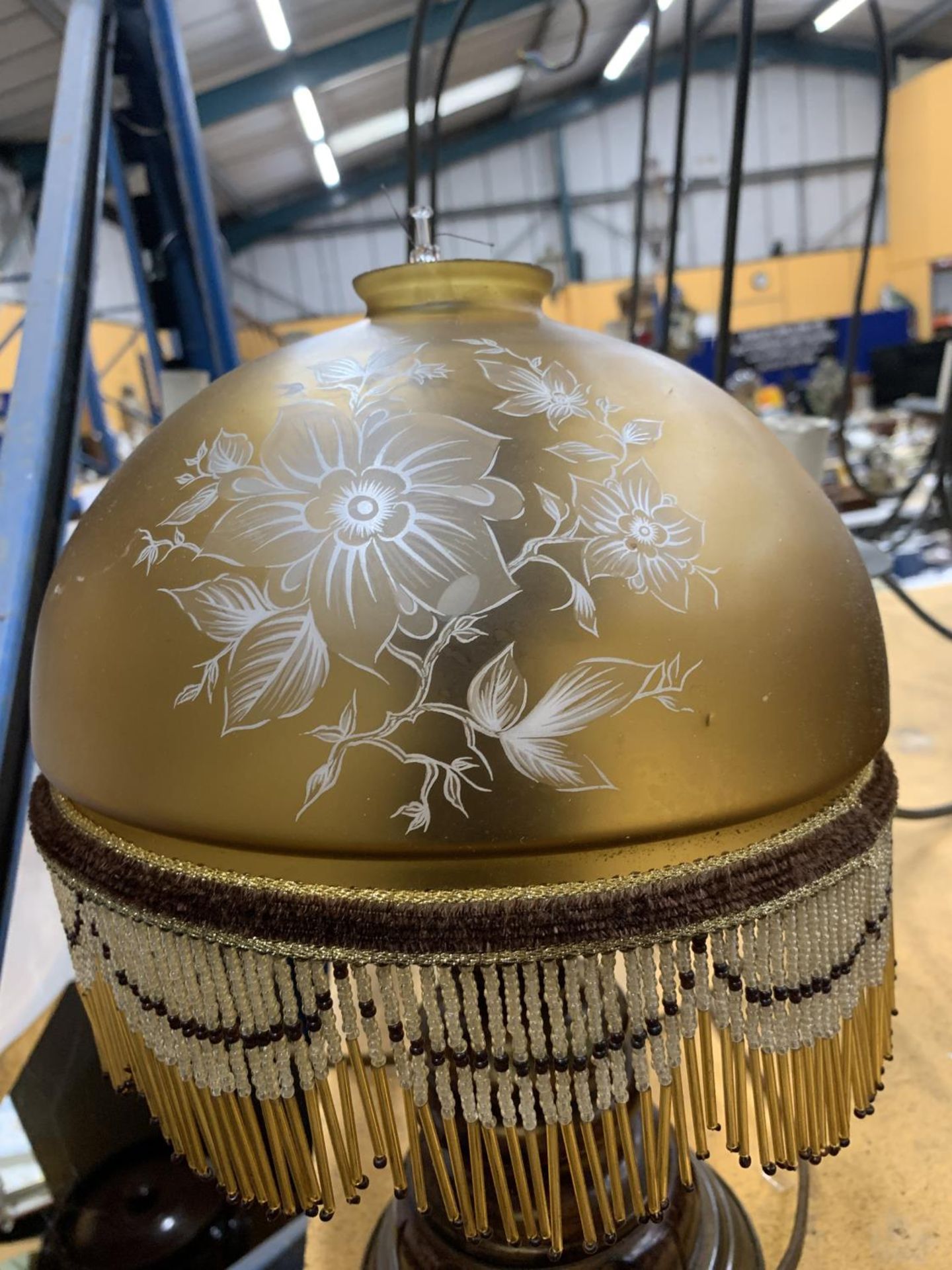 A VINTAGE TABLE LAMP WITH CARVED WOODEN BASE AND A GLASS LAMP SHADE WITH BEADING - Image 2 of 2