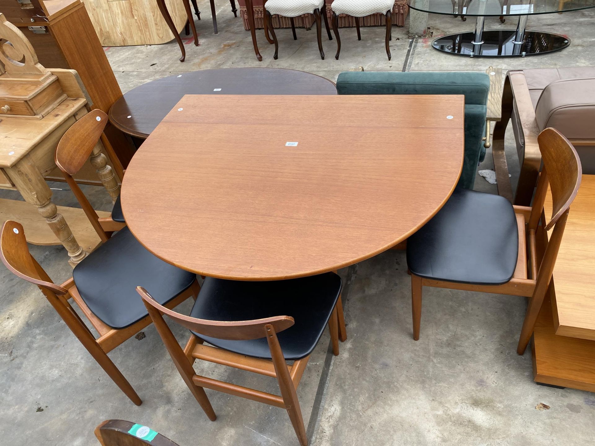 A RETRO TEAK GATELEG DINING TABLE, 60 X 42" OPENED AND FOUR DINING CHAIRS WITH BLACK FAUX LEATHER