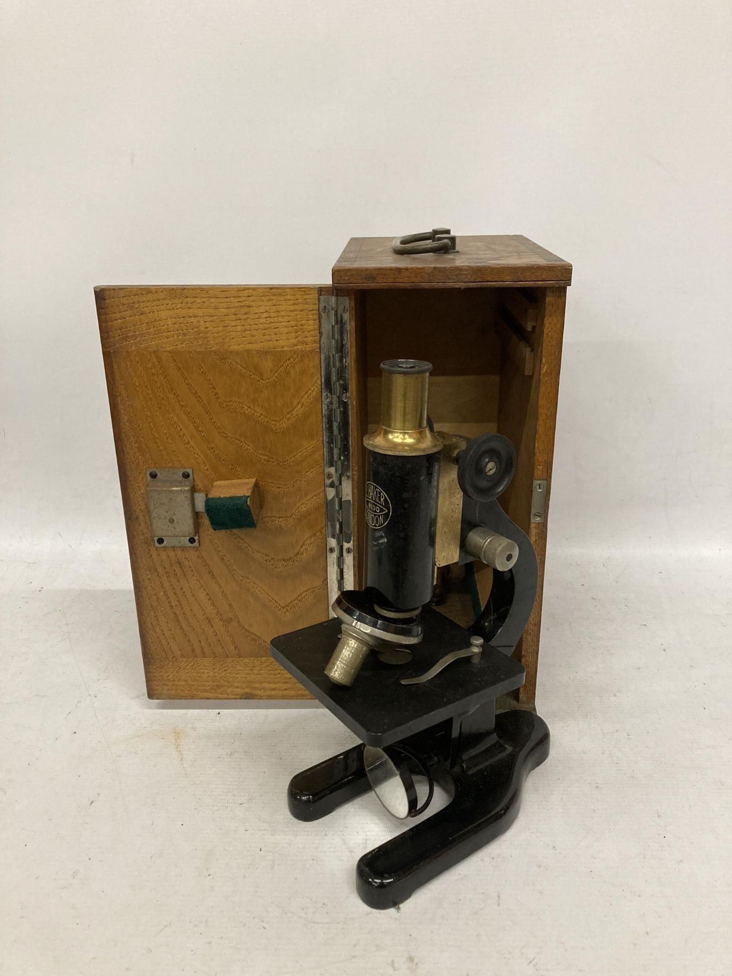 A VINTAGE CASED C.BAKER, LONDON MICROSCOPE