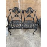 A CAST ALLOY TWO SEATER GARDEN BENCH