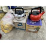 TWO KEL ELECTRIC KETTLES AND A LARGE QUANTITY OF YELLOW DUSTERS