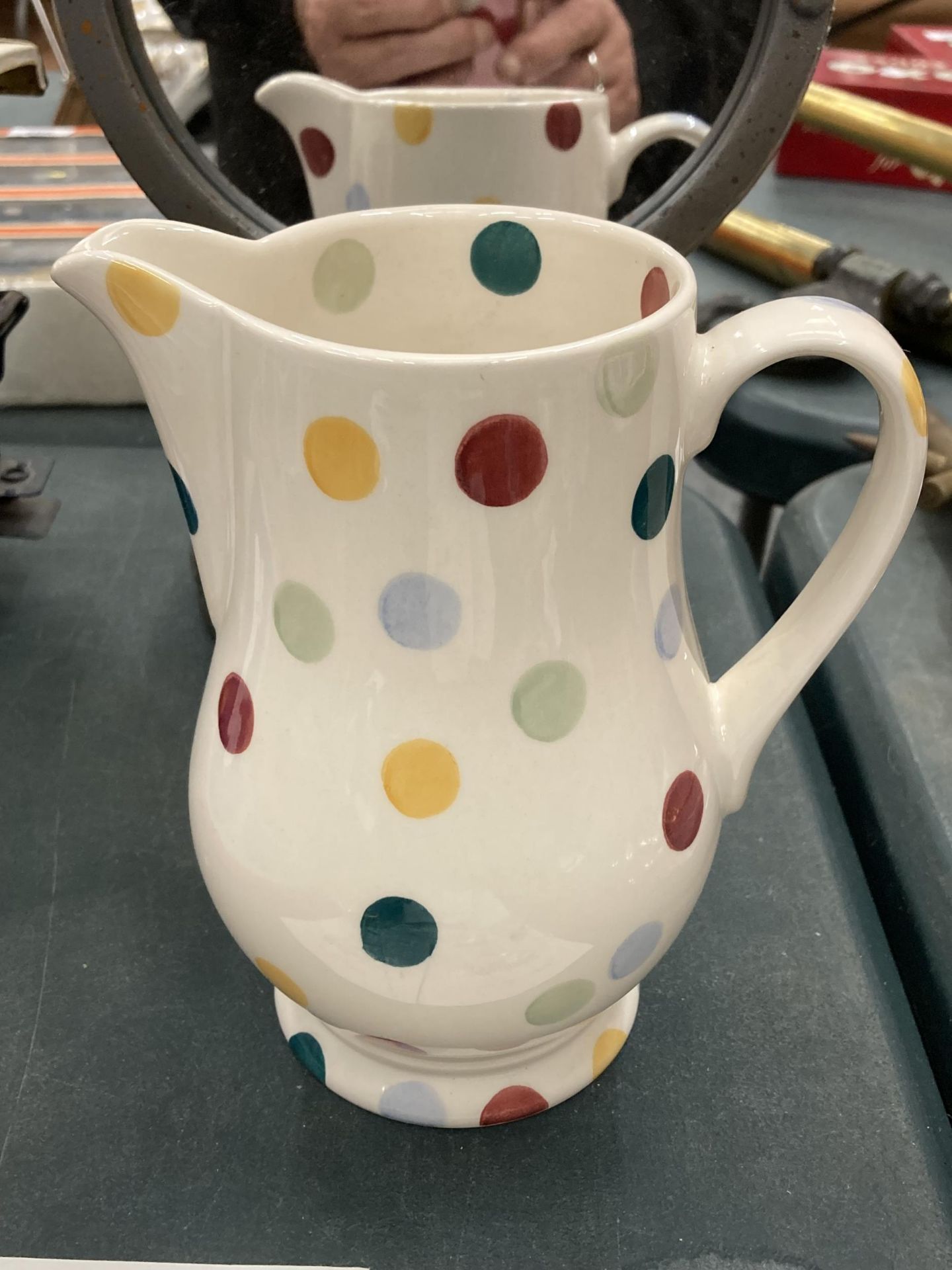 AN EMMA BRIDGEWATER JUG, HEIGHT 18CM