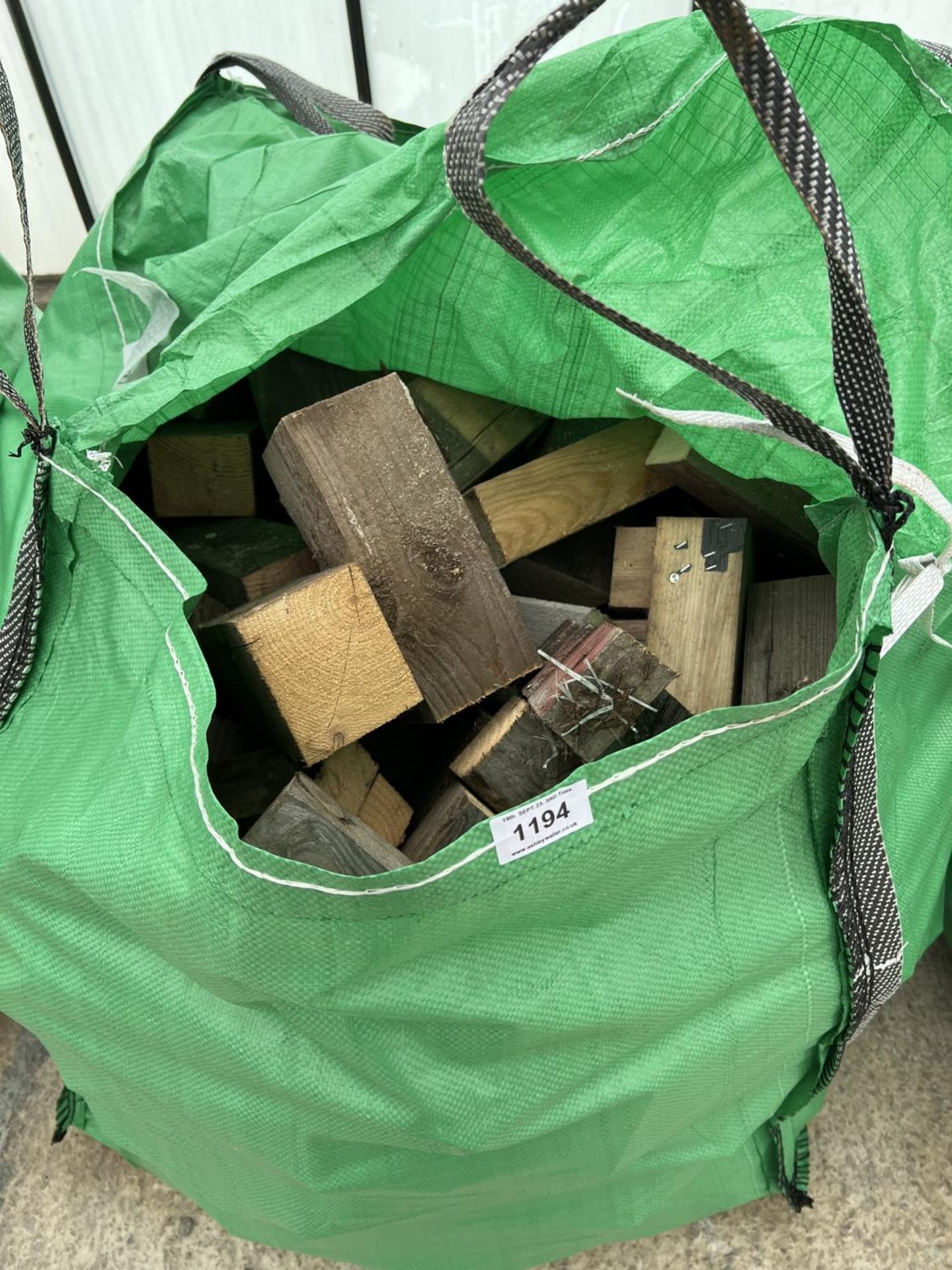 A TOTE BAG OF OFF CUT TIMBER NO VAT