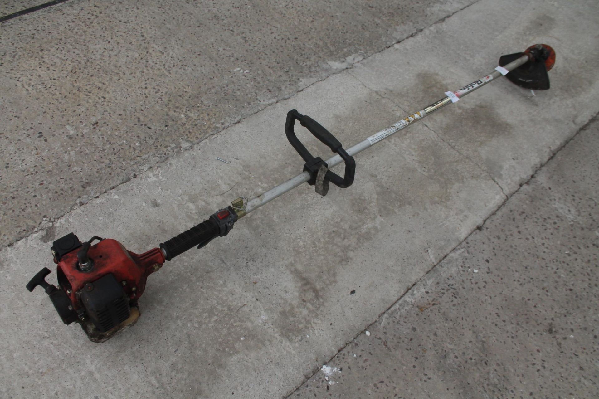 A ROBIN PETROL STRIMMER + VAT