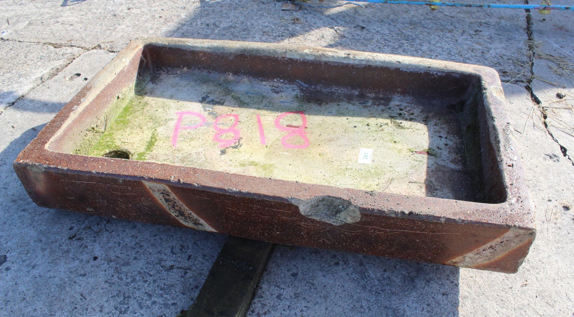 A BROWN GLAZED TROUGH NO VAT