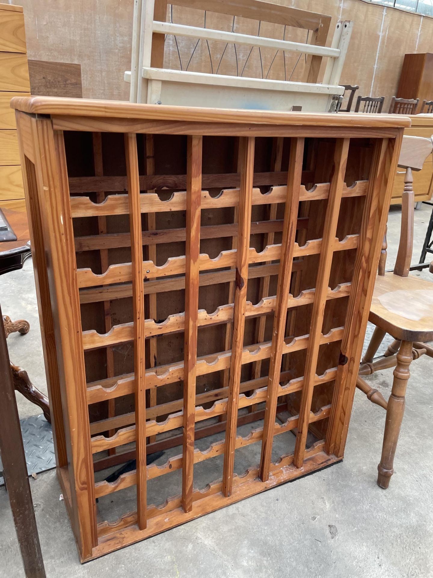 A PINE FORTY-TWO BOTTLE WINE RACK AND A PAIR OF KITCHEN CHAIRS - Image 2 of 3