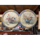 A PAIR OF CIRCULAR STILL LIFE PRINTS IN BLUE AND GILT FRAMES