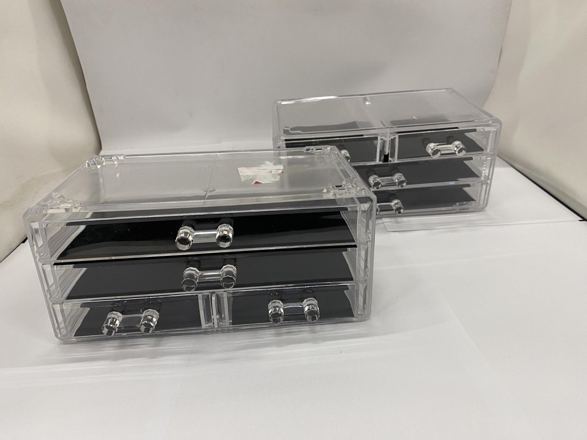 TWO SETS OF PLASTIC DRAWERS