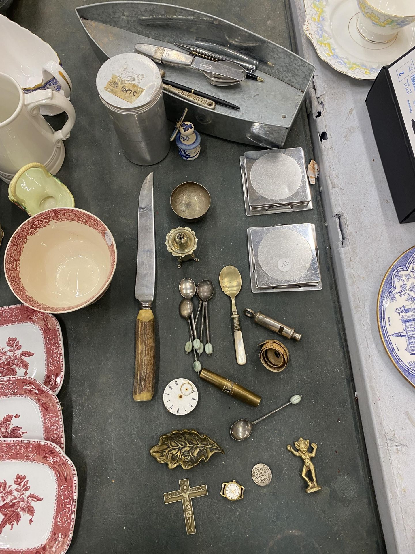 A MIXED LOT TO INCLUDE FLATWARE, COFFEE BEAN SPOONS, BRASS ITEMS, A POLICE WHISTLE, ETC