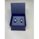 A PAIR OF 9CT WHITE GOLD EARRINGS