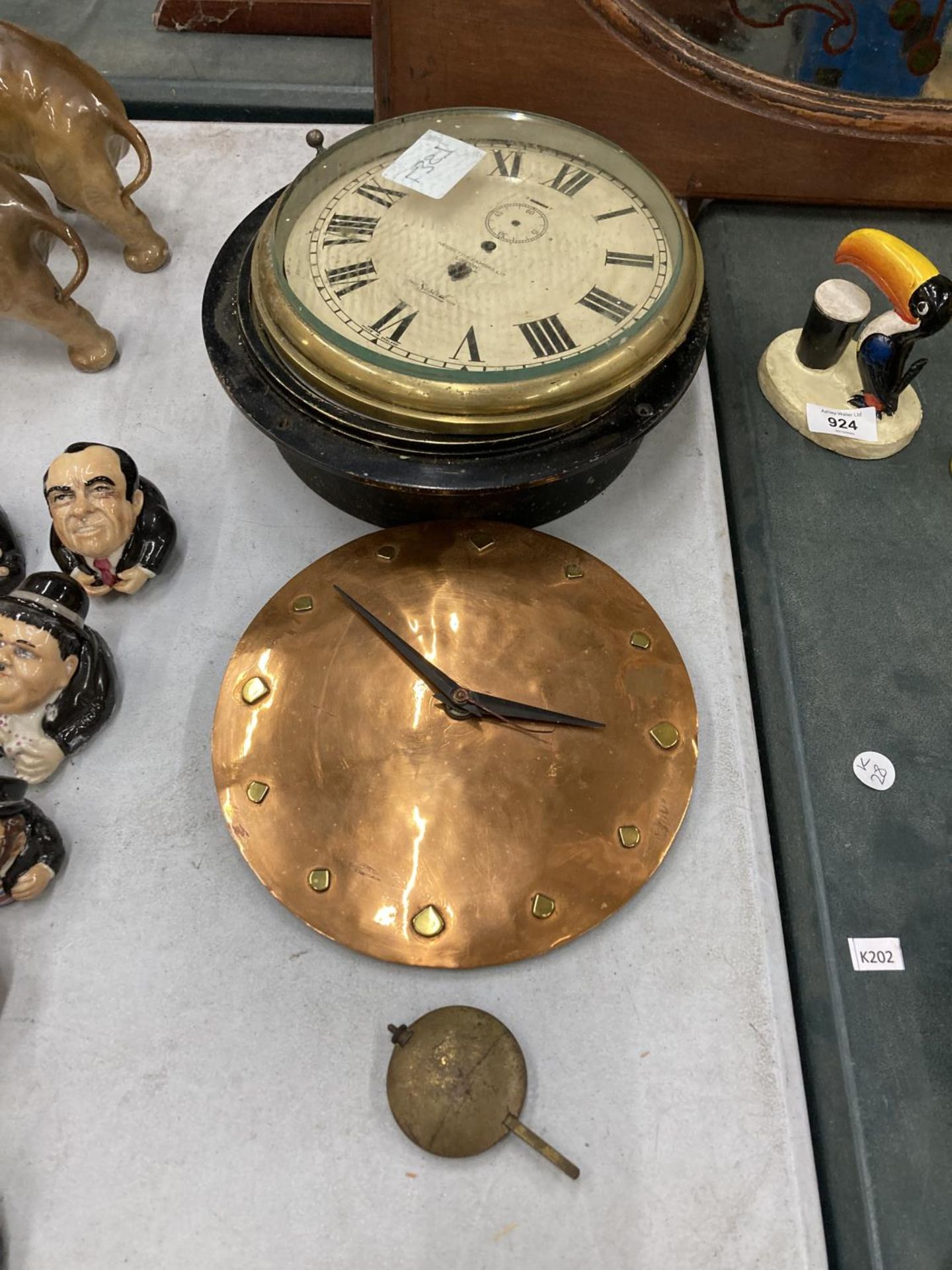 TWO VINTAGE CLOCKS TO INCLUDE A COPPER ONE AND A 'SESTREL' WALL CLOCK IN NEED OF RESTORATION