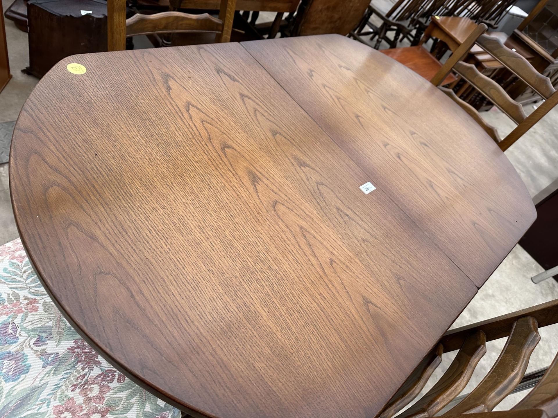 AN OAK OLD CHARM STYLE EXTENDING DINING TABLE, 50 X 32" (LEAF 15") AND FOUR LADDERBACK DINING CHAIRS - Image 2 of 5