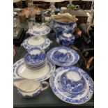 A COLLECTION OF BLUE AND WHITE DINNER WARES TO INCLUDE CAULDON, WILLOW PATTERNS ETC