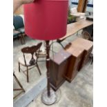 A BEECH STANDARD LAMP COMPLETE WITH SHADE