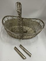 A VINTAGE WHITE METAL WINE HOLDER BASKET AND TWO SILVER PLATED HOLDERS