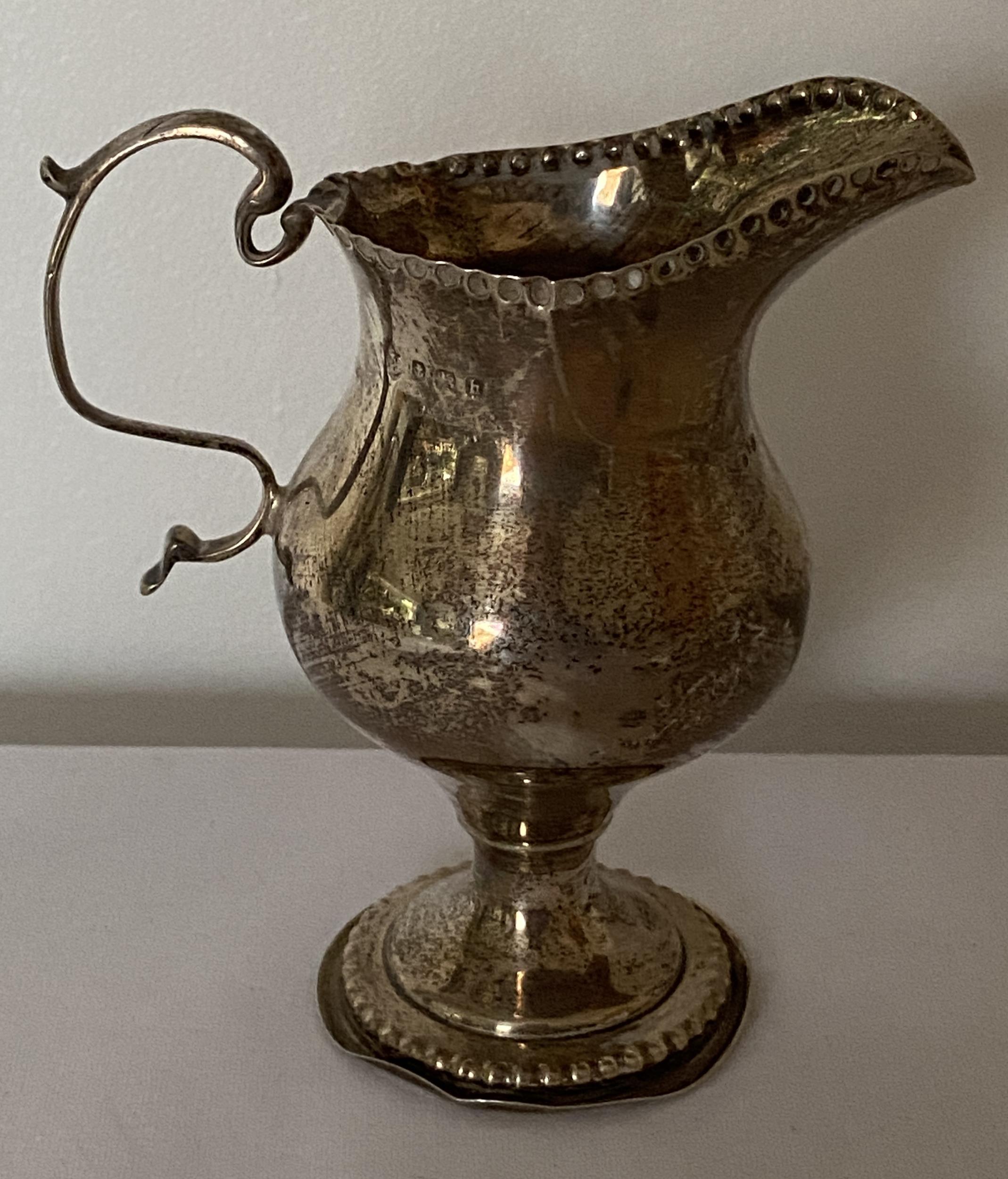 AN EDWARD VII 1903 HALLMARKED BIRMINGHAM SILVER CREAM JUG, MAKER INDISTINCT, GROSS WEIGHT 106 GRAMS