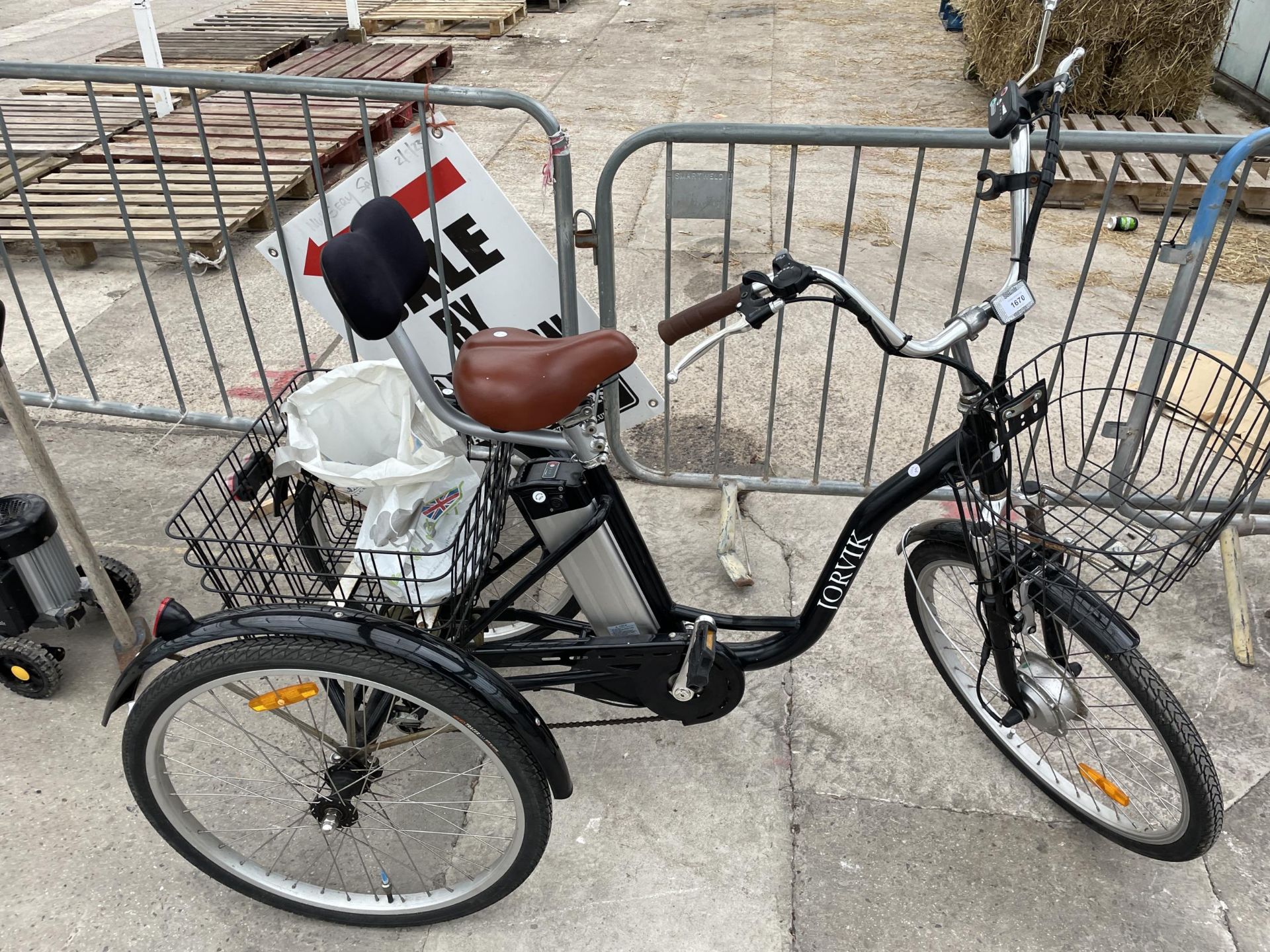 A JORVIK THREE WHEELED ELECTRIC BIKE COMPLETE WITH KEY AND CHARGER AND BELIEVED IN WORKING ORDER BUT